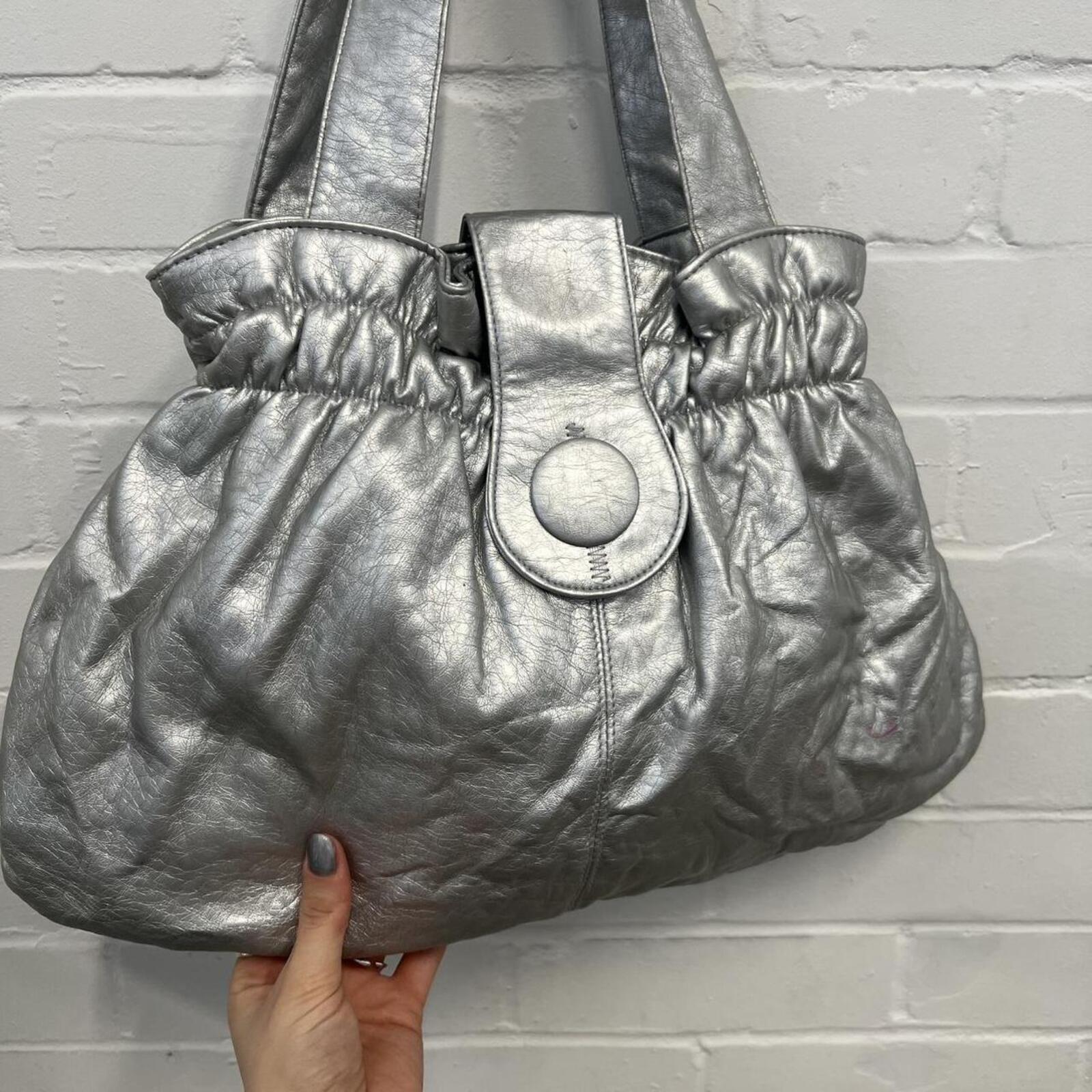 silver chrome metallic faux leather oversized handbag with chunky button detail
