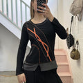 black and orange utility style long sleeve vintage top with contrast stitching