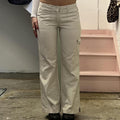 cream wide leg low rise vintage tailored style cargo trousers with pocket detail