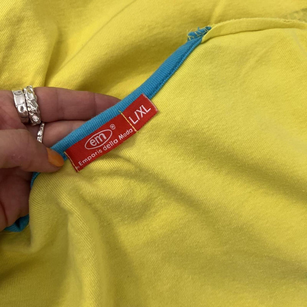 yellow and blue graphic vintage baby tee