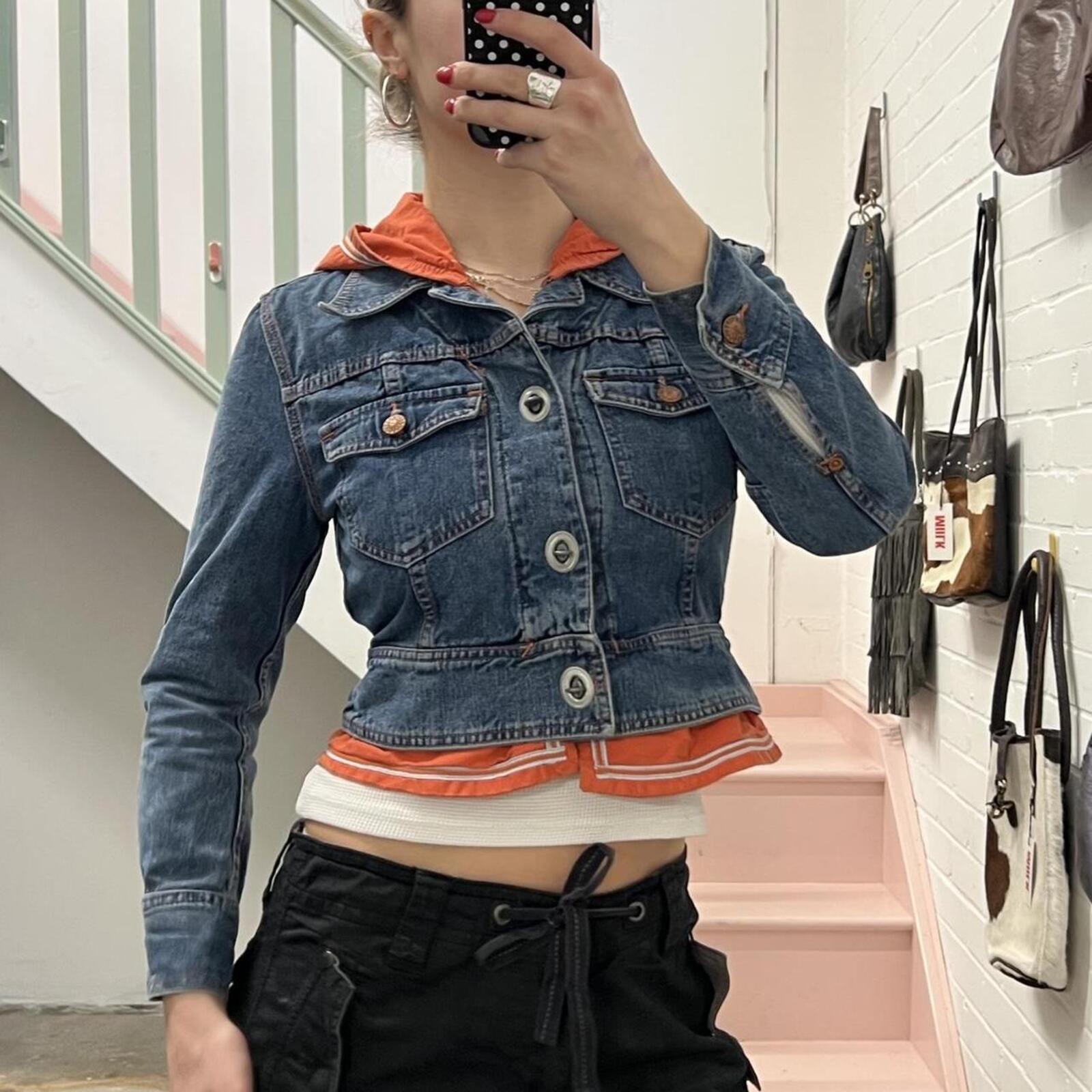 Fiorucci layered vintage denim jacket with orange hoodie layer