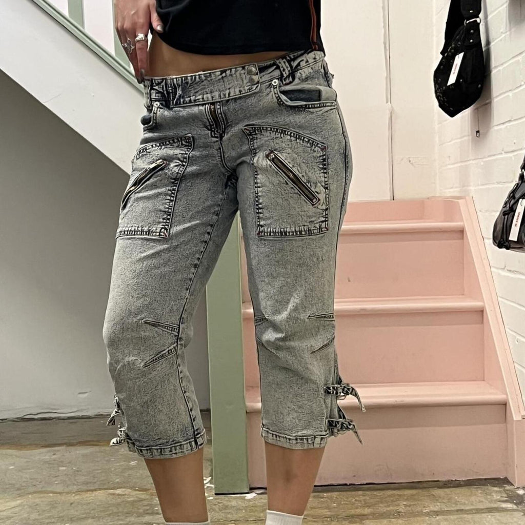 acid wash low rise denim capris with zips and buckles