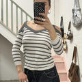 Morgan de Toi white and silver striped slouchy top with cut out shoulders