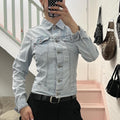 Baby blue light wash fitted button up denim jacket