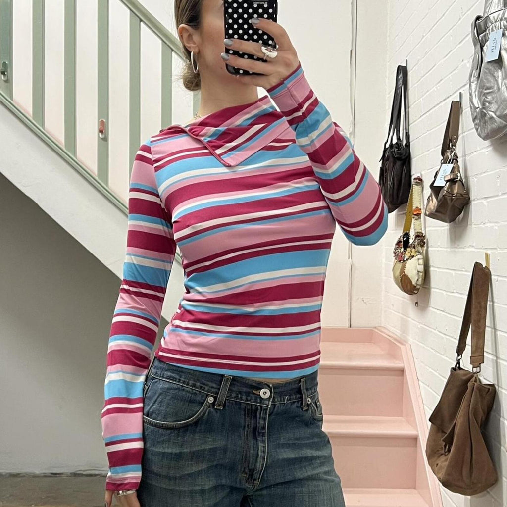 pink and blue striped high neck fitted top with zip detail