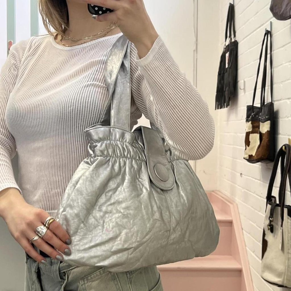 silver chrome metallic faux leather oversized handbag with chunky button detail